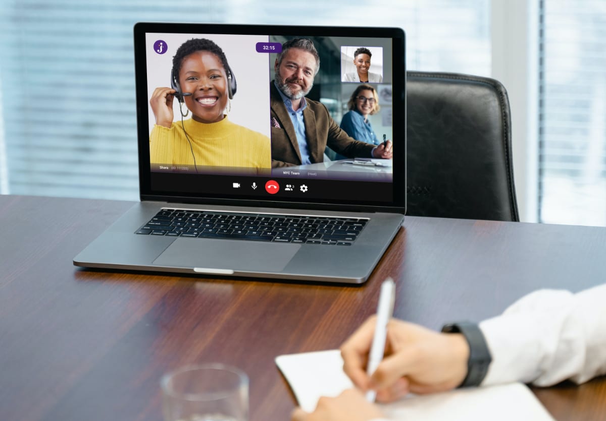 Laptop-on-desk-business-call-african-Interpreter-Jeenie