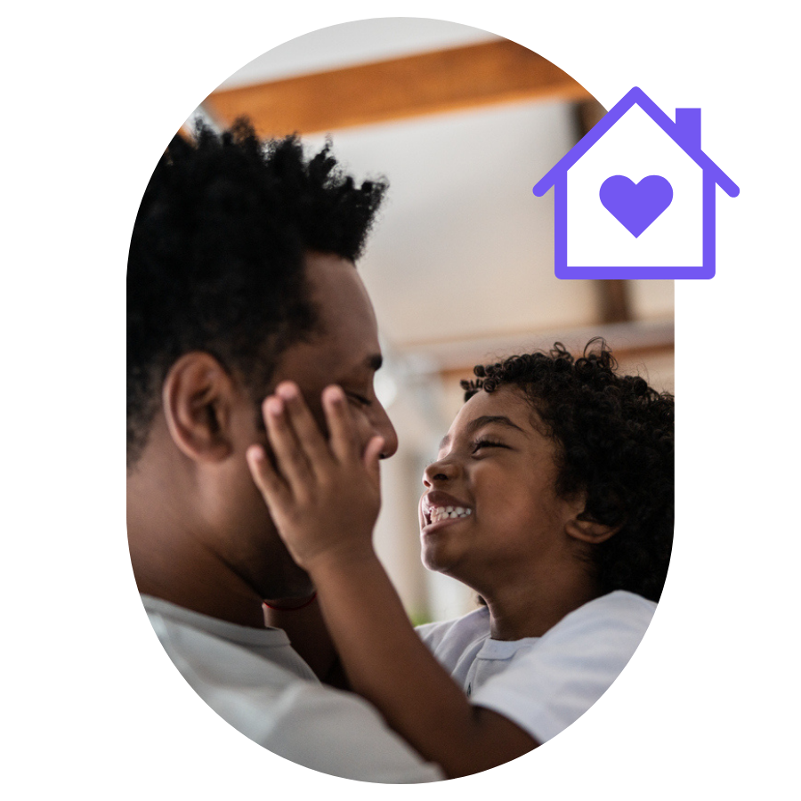 Happy African father and child in new home