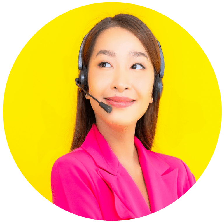 Jeenie Interpreter smiling on call with bright yellow background