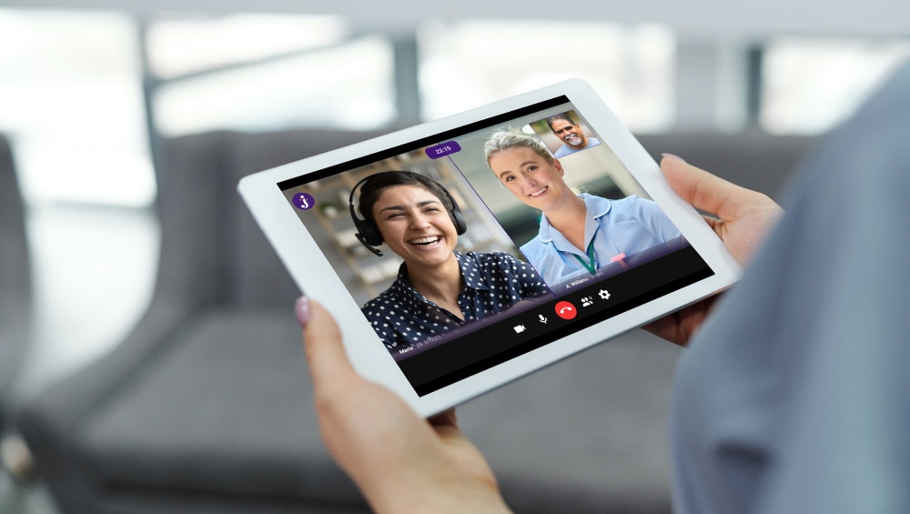 nurse holding tablet live jeenie spanish interpreter call